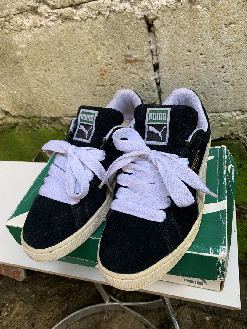 Puma Suede Classic Black White Sneakers (Category: Sneakers) located in Bacoor. Submitted by yaku.thrift (Listing ID 1440170318, Image 3). Description: - Classic Puma Suede sneakers -size 9 verygood condition - Color: Black with white laces - Features iconic Puma logo on tongue and side - Includes original Puma box - Ideal for everyday wear and versatile styling.