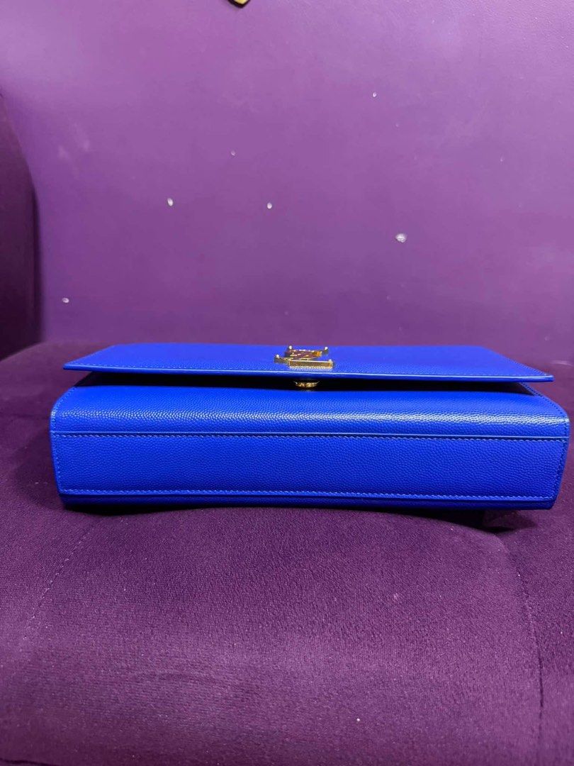 Saint Laurent YSL Royal Blue Monogram Chain Bag (Category: Luxury Bags & Wallets) located in Manila. Submitted by jonalyngal75237 (Listing ID 1440163931, Image 3). Description: - Authentic Saint Laurent YSL monogram chain bag - Vibrant royal blue pebbled leather - Iconic gold YSL logo on front flap - Gold chain strap - Perfect for adding a pop of color - Includes Saint Laurent authenticity card.