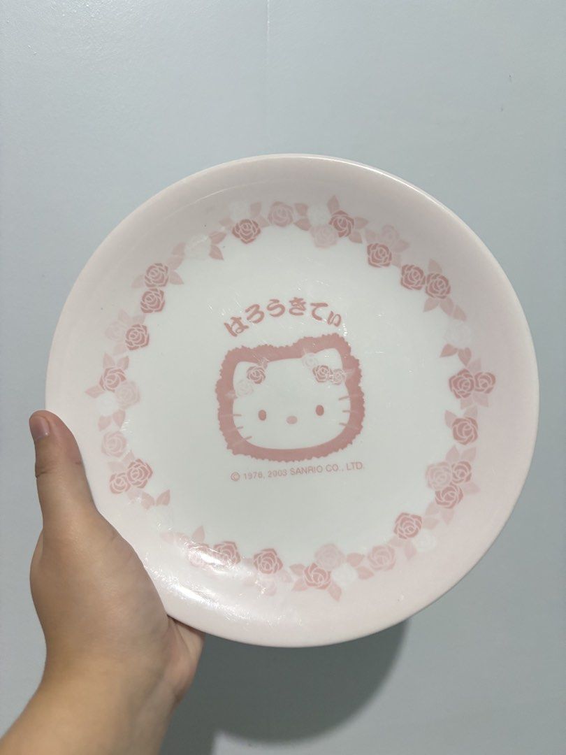 Sanrio Hello Kitty Pink Rose Plate (Category: Dinnerware & Cutlery) located in Baguio. Submitted by leeeeeeeeeeen (Listing ID 1440027335, Image 1). Description: - Adorable pink plate with classic Kitty design - Features a delicate rose border - Perfect for kitchen use or as a decorative piece - Authentic Sanrio product - A must-have for Kitty fans.