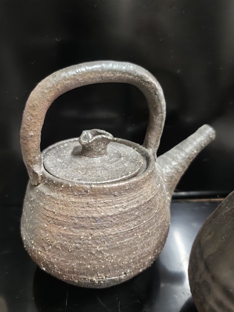 Set of 2 Vintage Ceramic Teapots (Category: Coffee & Tea Tableware) located in Rizal. Submitted by gkstcenit (Listing ID 1439997789, Image 3). Description: - Set of 2 vintage ceramic teapots - Unique rustic design with handle and spout - Perfect for display or serving tea - Adds a touch of vintage elegance - Earthy tones and textured finish for unique character.