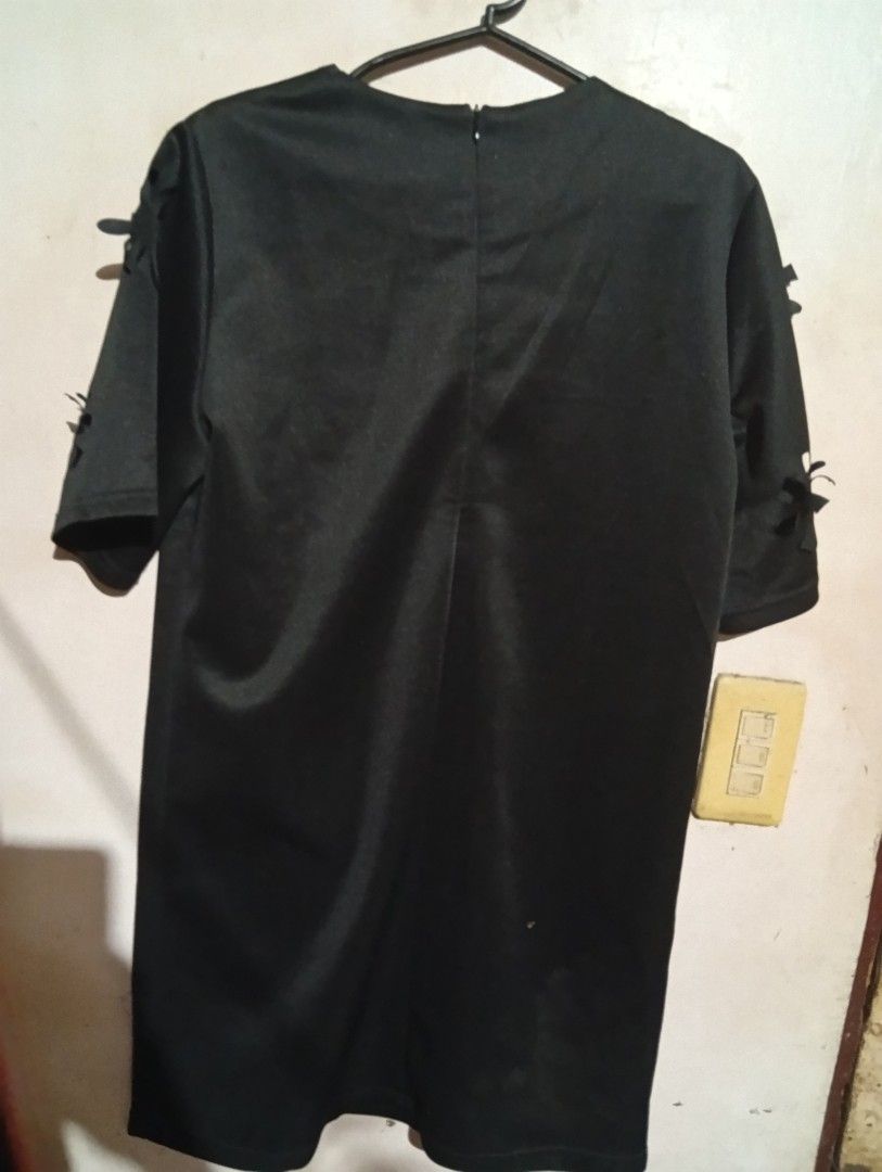 Something Borrowed Black Cut-out Dress Size M (Category: Dresses) located in Las Pinas. Submitted by magda09 (Listing ID 1440182227, Image 2). Description: - Chic black dress by Something Borrowed from Zalora - Unique floral cut-out details on front and sleeves - Short sleeves - Comfortable fit - Back zipper closure - Perfect for night outs or special occasions.
