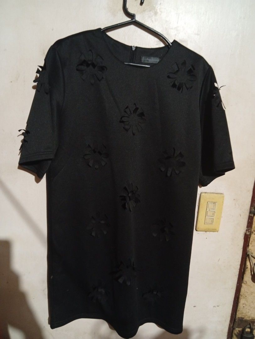 Something Borrowed Black Cut-out Dress Size M (Category: Dresses) located in Las Pinas. Submitted by magda09 (Listing ID 1440182227, Image 1). Description: - Chic black dress by Something Borrowed from Zalora - Unique floral cut-out details on front and sleeves - Short sleeves - Comfortable fit - Back zipper closure - Perfect for night outs or special occasions.