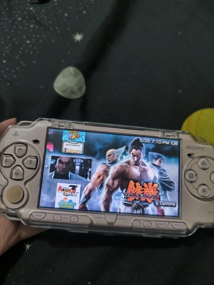 Sony PSP 2000 Rose Gold (negotiable) (Category: Others) located in Makati City. Submitted by valeriojc_ (Listing ID 1440107952, Image 2). Description: - Sony PSP 3000 in beautiful Rose Gold - Original AC adapter and charger included - Comes with a protective clear casing - Pre-loaded with popular games: Tekken 6, The Warriors, Tetris, Pokemon, and Zuma - Ready for gaming adventures anywhere! Description Inclusions: Crystal case 32gb microsd No is