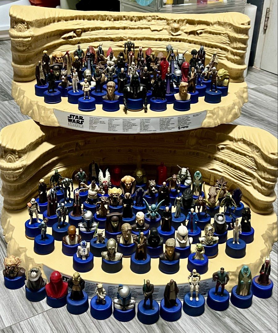Star Wars Episode II Pepsi Bottle Cap Figures Display (Category: Vintage Collectibles) located in Manila. Submitted by thegreyhousemarket (Listing ID 1440165632, Image 1). Description: - Complete set of Star Wars Episode II Pepsi bottle cap figures. - Features characters from the movie. - Comes with a desert-themed display stand. - Includes a variety of character figures and busts. - A must-have collectible for Star Wars fans..