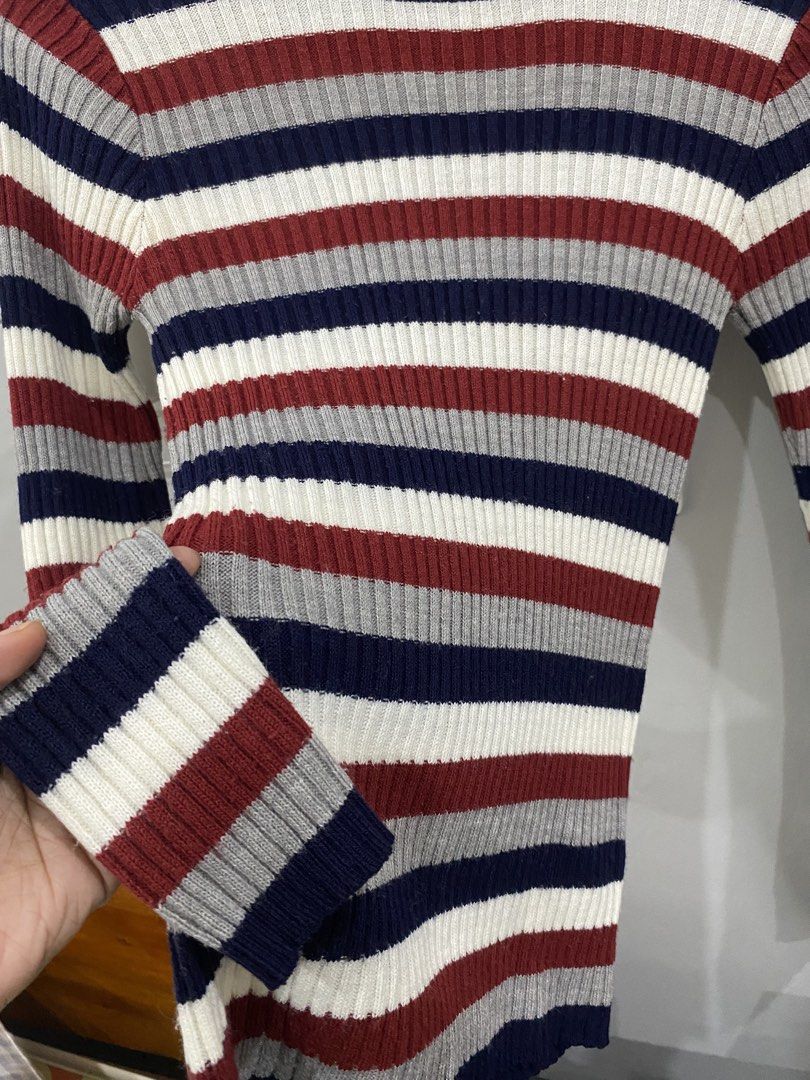 Striped Ribbed Mock Neck Long Sleeve Sweater (Category: Longsleeves) located in Kalibo. Submitted by bonsaiclo (Listing ID 1440063992, Image 3). Description: - Ribbed long-sleeve sweater - Mock neckline - Classic horizontal stripe pattern - Available colors: Navy blue, Burgundy, Grey, White - Fitted style - Perfect for layering or wearing alone - Versatile wardrobe addition.