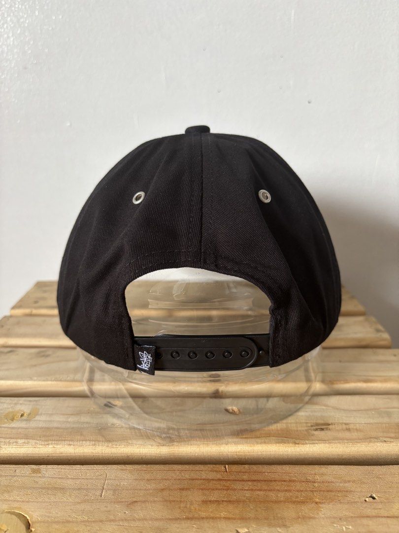 Stussy Black Snapback Cap with Blue '8' Logo (Category: Caps & Hats) located in Manila. Submitted by truepenguin_f2a806 (Listing ID 1440020666, Image 2). Description: - Classic black Stussy snapback cap - Prominent blue embroidered '8' logo on front - Flat brim - Adjustable snap closure at the back - Ideal for casual and streetwear looks.
