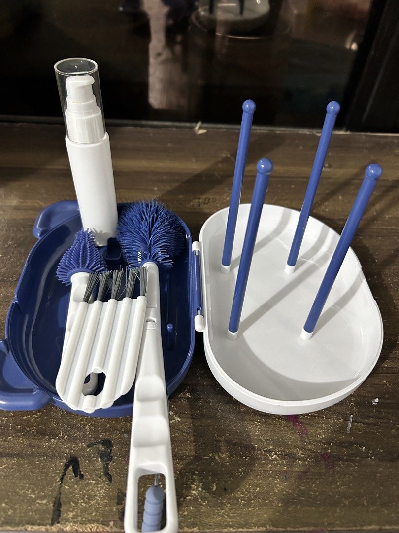 Supermama Baby Bottle Cleaning Brush Set with Case (Category: Breastfeeding & Bottle Feeding) located in Las Pinas. Submitted by jacobstoyland (Listing ID 1440165627, Image 2). Description: - Still with box - Keep baby bottles sparkling clean with the Supermama bottle cleaning set. - Comes with a convenient carrying case shaped like a cute bear. - Set includes various brushes for thorough cleaning. - Features a drying rack for convenience. - Perf