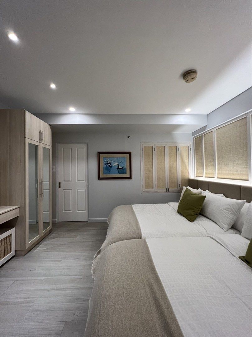 Tagaytay Highlands - Belle View (Category: Vacation Rentals) located in Taguig. Submitted by gelo848 (Listing ID 1440193849, Image 3). Description: 1 bedroom newly renovated unit. 94 sqm FA with 40 sqm balcony facing Taal Lake. Fully furnished with 2 double beds, 1 sofa bed, ref, dishwasher, microwave, bath tub/jacuzzi .