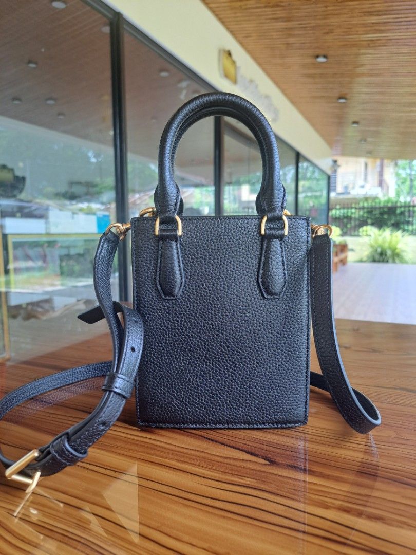 Tory Burch Mini Black Shopper Tote Black Bag (Category: Luxury Bags & Wallets) located in Tagum. Submitted by luxestreetbags (Listing ID 1440012768, Image 3). Description: Tingnan nyo namn ang details mapapaWOW ka talaga sa subrang ganda 🤗🥰 Authentic/Original Tory.Burch Mini Blake Shopper Tote Black Bag, Pre-owned ‼️‼️❤️‍🔥❤️‍🔥 Made in Cambodia With code In looks new condition. ❤️‍🔥 Legit online seller since 2016 with Physical Store‼️‼️ Locat