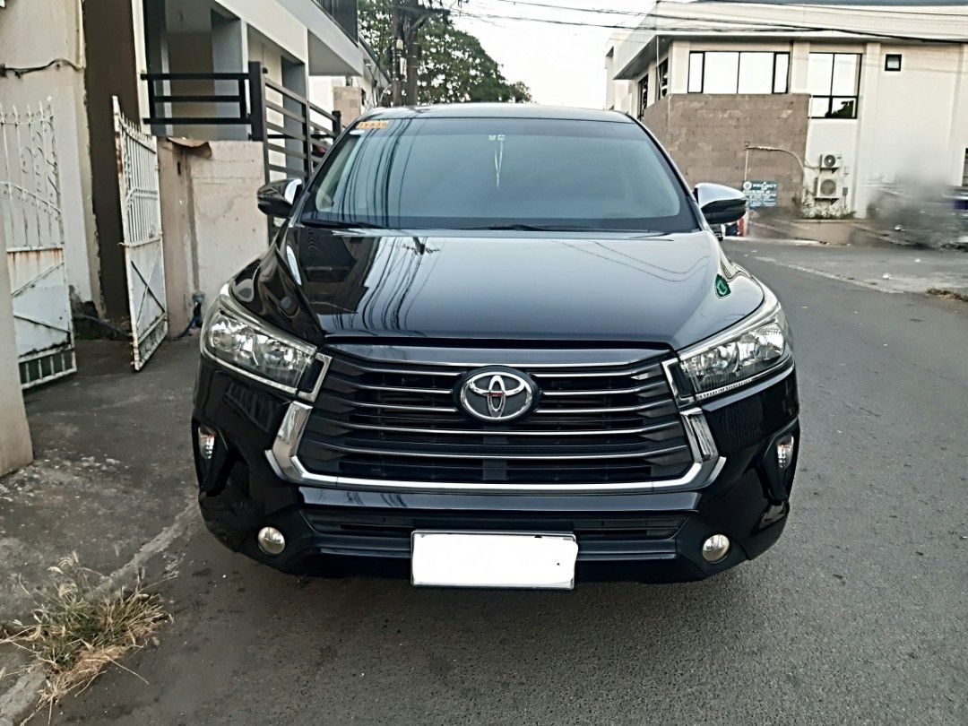 Toyota Innova G AT Auto (Category: Used Cars) located in Quezon City. Submitted by gene52108 (Listing ID 1440053514, Image 2). Description: 2022 Toyota Innova G AT 2.8 Diesel Engine. Color: Attitude Black ( Original ) Mileage: 70km+++ ( original with Records) All Stock Very Well Maintained and in Very Prestine Condition. Ambient lights, folding side Mirrors, back camera and sensors, GPS. Updated Registration. Complete Legal Papers. Car Buying Ass