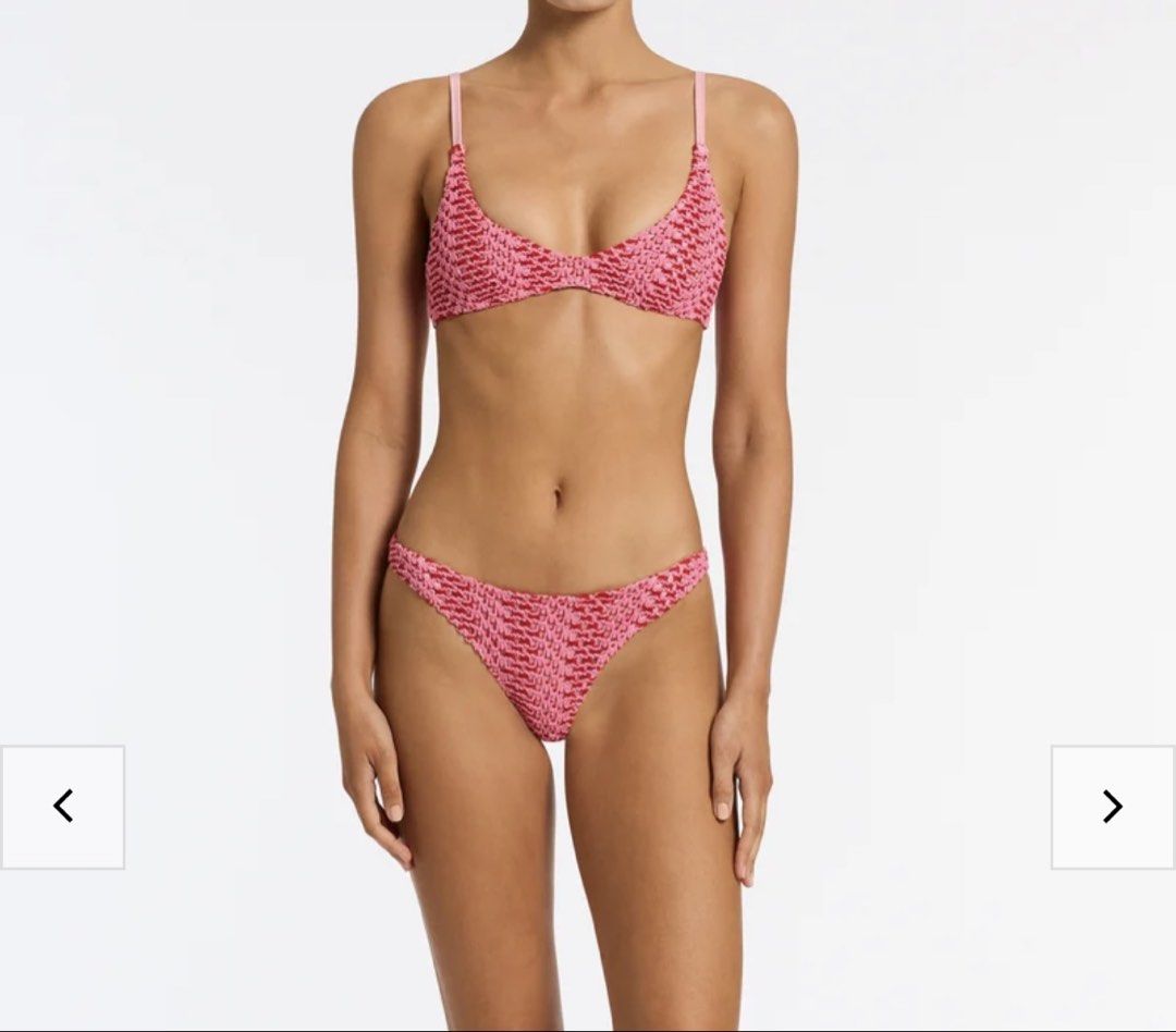 TRIANGL Crochet Bikini Set - Pink & Red (Category: Bikinis & Swimsuits) located in Singapore. Submitted by lou______ (Listing ID 1440026271, Image 3). Description: - Cute crochet bikini set from TRIANGL - Textured pink and red pattern - Top: Size Small - Bottoms: Size X-Small - Ideal for beach vacations or pool days.