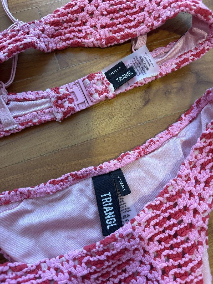 TRIANGL Crochet Bikini Set - Pink & Red (Category: Bikinis & Swimsuits) located in Singapore. Submitted by lou______ (Listing ID 1440026271, Image 2). Description: - Cute crochet bikini set from TRIANGL - Textured pink and red pattern - Top: Size Small - Bottoms: Size X-Small - Ideal for beach vacations or pool days.