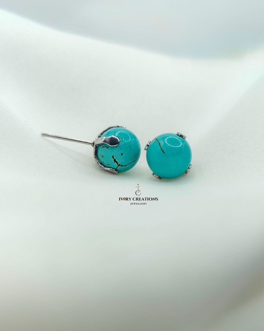 Turquoise Grandeur Necklace (Category: Necklaces) located in Valenzuela. Submitted by ivorycreations (Listing ID 1440195448, Image 3). Description: - Beautiful turquoise necklace with a unique silver-toned clasp. (P3999) - Matching turquoise stud earrings. (P1150) - Statement ring featuring a turquoise stone surrounded by small clear stones. (P1350) - Ideal for gifting or personal indulgence..