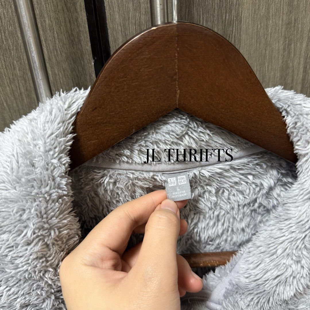 UNIQLO Silver Gray Fleece Full Zip Jacket (Category: Coats, Jackets and Outerwear) located in Cavite. Submitted by jlthrifts_ (Listing ID 1440036557, Image 3). Description: Bagong bago pa! 🫶🏻 Size on tag: Large Dimes: 25x18 Fits to Small body frame..