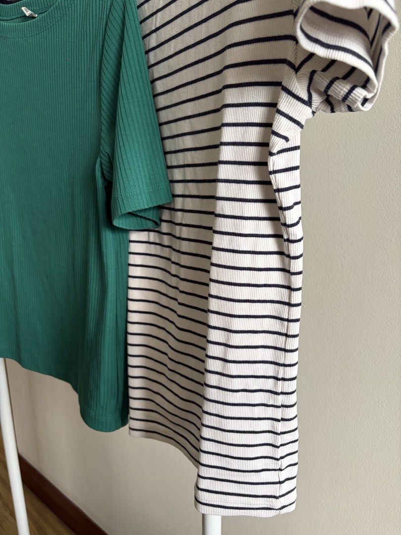 Uniqlo Striped & Green Ribbed Tops Bundle (Category: Shirts) located in Makati City. Submitted by rihannie (Listing ID 1440021518, Image 3). Description: - Bundle of 3 comfortable tops - Includes 2 striped t-shirts (navy and white) - Size Large - Includes 1 solid green ribbed t-shirt - Size Medium - Perfect for casual wear and layering - Made with a soft and stretchy cotton, rayon, and spandex blend.