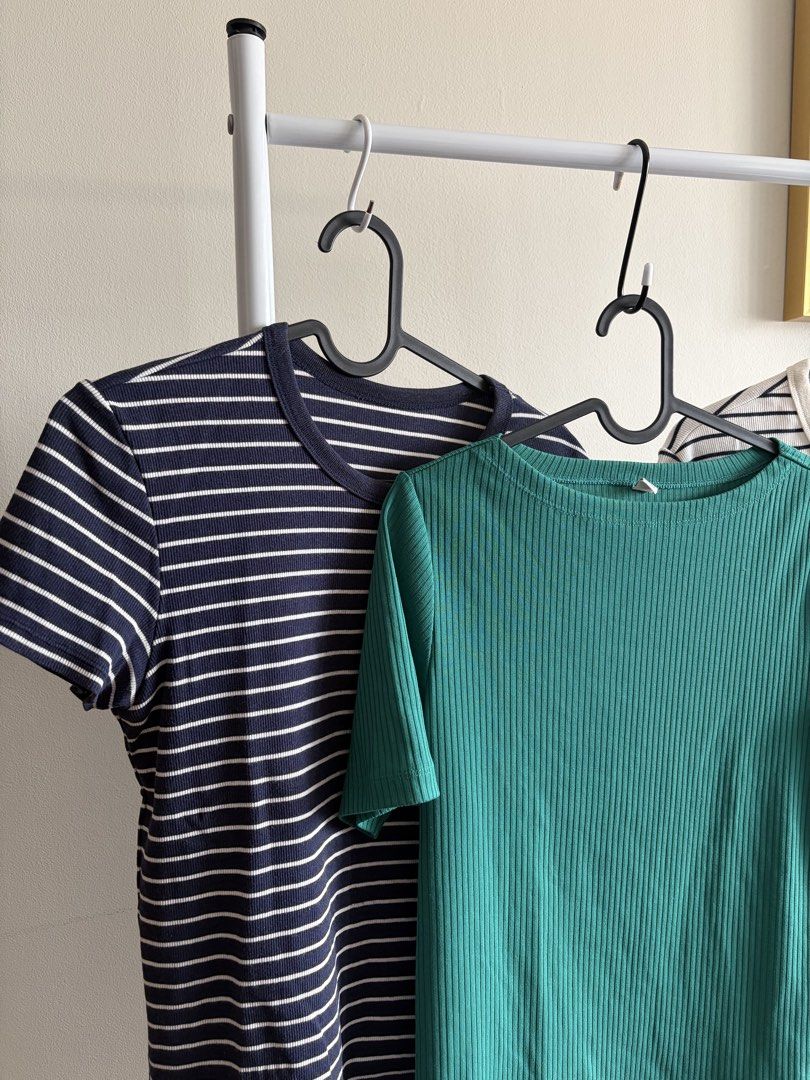 Uniqlo Striped & Green Ribbed Tops Bundle (Category: Shirts) located in Makati City. Submitted by rihannie (Listing ID 1440021518, Image 2). Description: - Bundle of 3 comfortable tops - Includes 2 striped t-shirts (navy and white) - Size Large - Includes 1 solid green ribbed t-shirt - Size Medium - Perfect for casual wear and layering - Made with a soft and stretchy cotton, rayon, and spandex blend.
