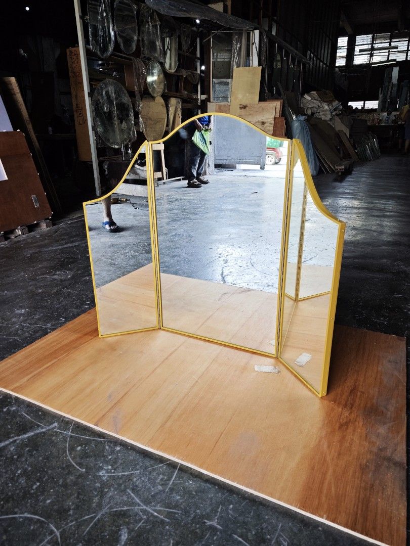 Vanity Table Top Mirror 2.5ft x 3ft (Category: Mirrors) located in Malabon City. Submitted by mirrors.ph (Listing ID 1440019466, Image 3). Description: - Gold framed tri-fold vanity mirror - Dimensions: Approx. 2.5 feet x 3 feet - Ideal for dressing tables or makeup stations - Adjustable side panels for a wide, customizable view Size: 2.5ft H x 3ft W Customize sizes and shapes are welcome .