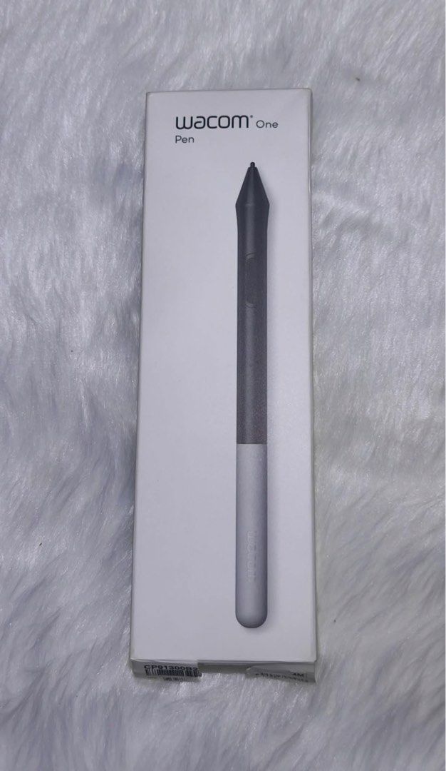 Wacom One Pen with Accessories (Category: Other Accessories) located in Manila. Submitted by liezl_27 (Listing ID 1440052477, Image 1). Description: - Wacom One Pen for digital art and design - Textured grip sleeve for comfortable handling - Includes replacement nibs - Sleek dark grey and light grey design - Compatible with Wacom One creative displays.