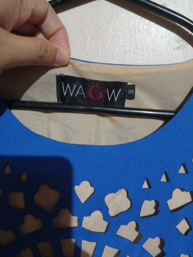 WAGW Blue Laser-Cut Top Size S (Category: Others Tops) located in Las Pinas. Submitted by magda09 (Listing ID 1440182163, Image 3). Description: - Stylish blue top - Features intricate cut-out details - Round neckline - Short sleeves - Inner lining for comfort - Perfect for a chic and trendy look.