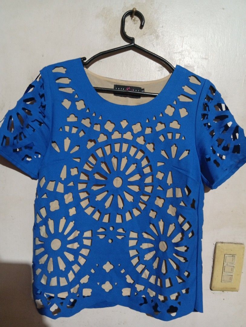 WAGW Blue Laser-Cut Top Size S (Category: Others Tops) located in Las Pinas. Submitted by magda09 (Listing ID 1440182163, Image 1). Description: - Stylish blue top - Features intricate cut-out details - Round neckline - Short sleeves - Inner lining for comfort - Perfect for a chic and trendy look.