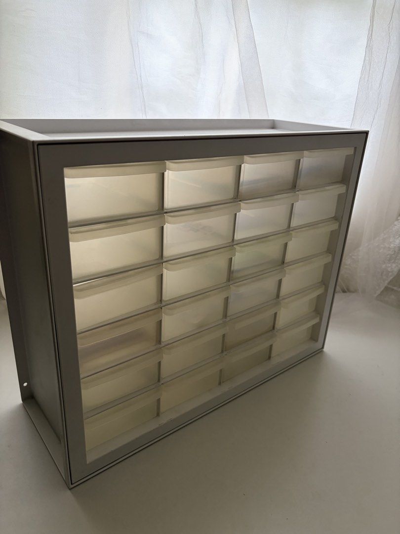 White 24-Drawer Storage Organizer Cabinet (Category: Storage Boxes & Baskets) located in Cainta. Submitted by desbarroga (Listing ID 1440119892, Image 2). Description: rfs: decluttering amazon iris 24 drawer best for small items (stationery, make up, anik anik) ✨ 2000 orig price 2400 MOP: Maya, Maribank, BDO, BPI, Gcash MOD: Lalamove / grab from Cainta - White 24 drawer storage cabinet - semi Transparent drawers for easy content identification - 