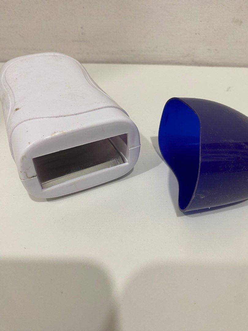 White and Blue Epilator with Detachable Cap (Category: Hair) located in Tarlac. Submitted by theunion (Listing ID 1440085872, Image 1). Description: - White and blue epilator - Metallic shaving head - Includes detachable blue cap - Perfect for hair removal - Compact and easy to use.