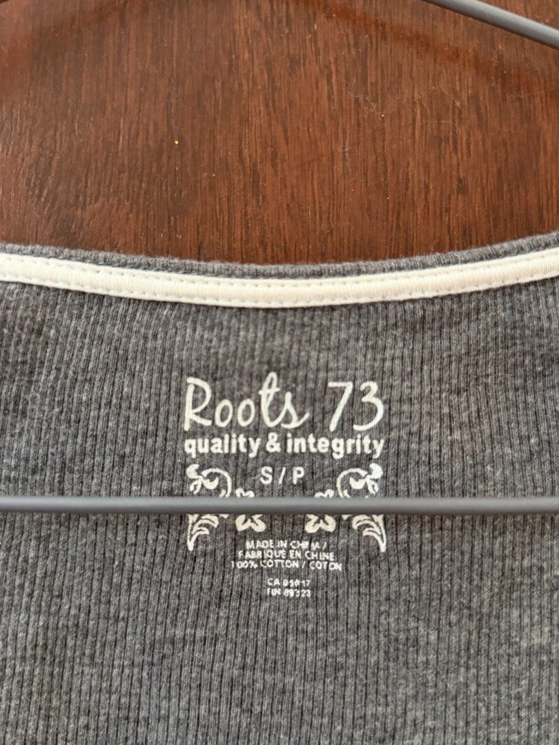 Y2K Grey Henley Shirt (Category: Longsleeves) located in Manila. Submitted by twicetold (Listing ID 1440051127, Image 3). Description: - from Canada - Features: Front kangaroo pocket, layered look with white hem - Material: 100% Cotton - super nice! fits S-L (stretchable, comfortable cloth).