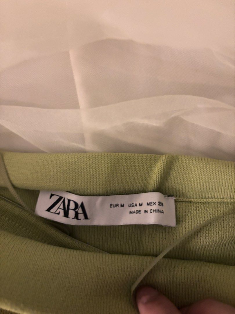 Zara Ruched Mesh Overlay Top Lime Green (Category: Blouses) located in Quezon City. Submitted by sophabsells (Listing ID 1440175384, Image 3). Description: - Stylish Zara top in lime green - Features a ruched mesh overlay for texture - Sleeveless design - Flattering fit - Versatile for casual or dressed-up looks.