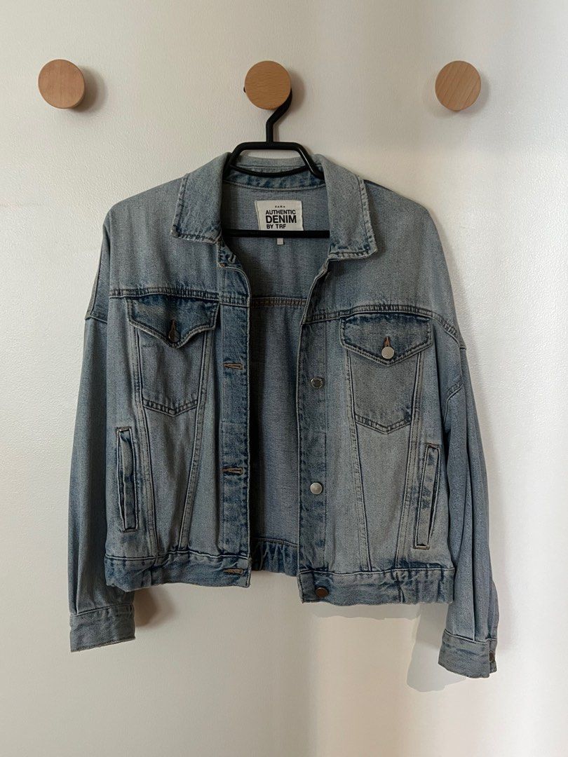 ZARA TRF denim jacket (Category: Coats, Jackets and Outerwear) located in Pasig City. Submitted by tiny_studios (Listing ID 1440184647, Image 3). Description: - Zara Authentic denim - Oversize fit - shoulder 60cm - sleeves 54cm - length 54cm - chest 56cm - model usually wears xs - very thick and sturdy denim - buttons still very shiny.