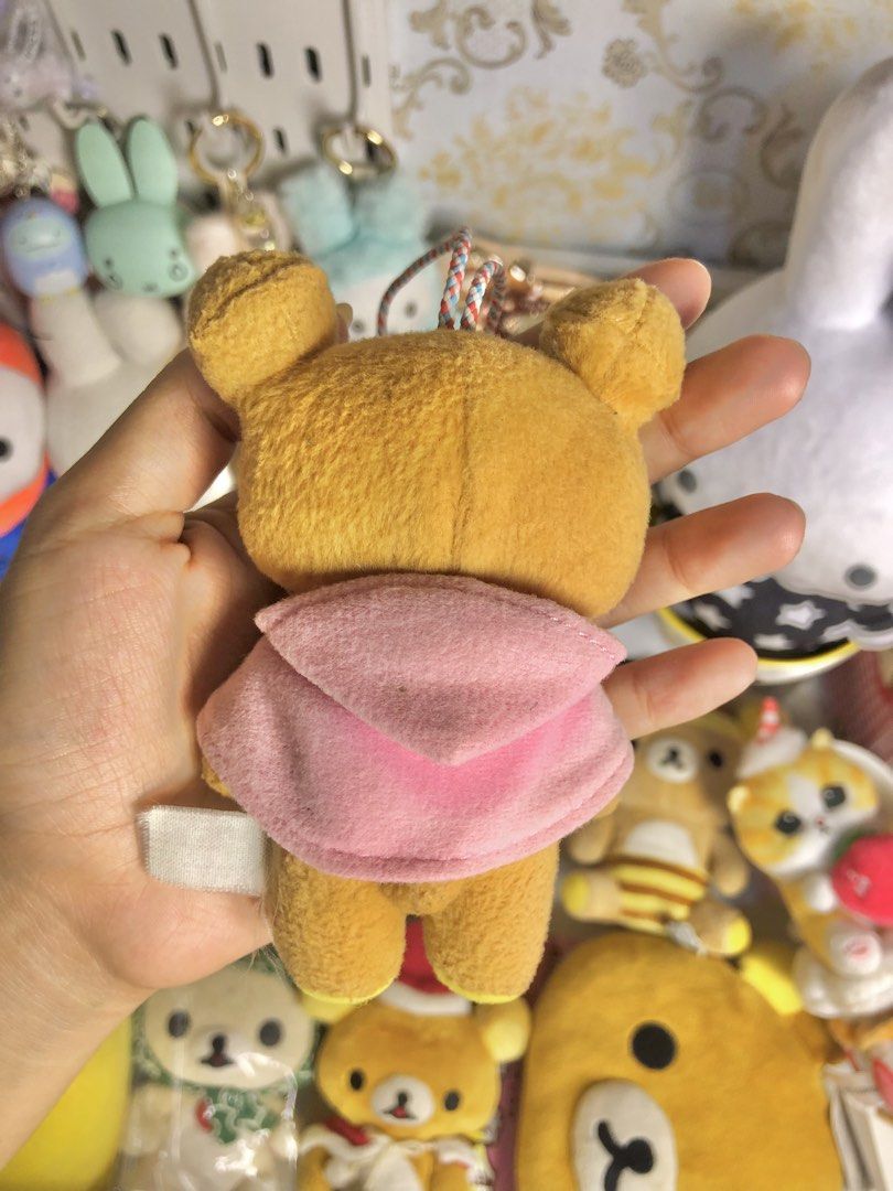 7-Eleven Rilakkuma Pink Cloak Keychain (Category: Toys & Games) located in Caloocan City. Submitted by rujiyosan (Listing ID 1440199312, Image 2). Description: Faded tag Good condition.