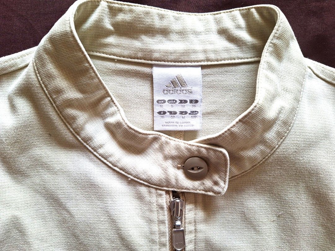 Adidas Beige Zip Jacket, Size S, Shoulder 14in (Category: Coats, Jackets and Outerwear) located in Pasig City. Submitted by brocolli888 (Listing ID 1440288924, Image 3). Description: Adidas Beige Zip Jacket, Size S, Shoulder 14in.