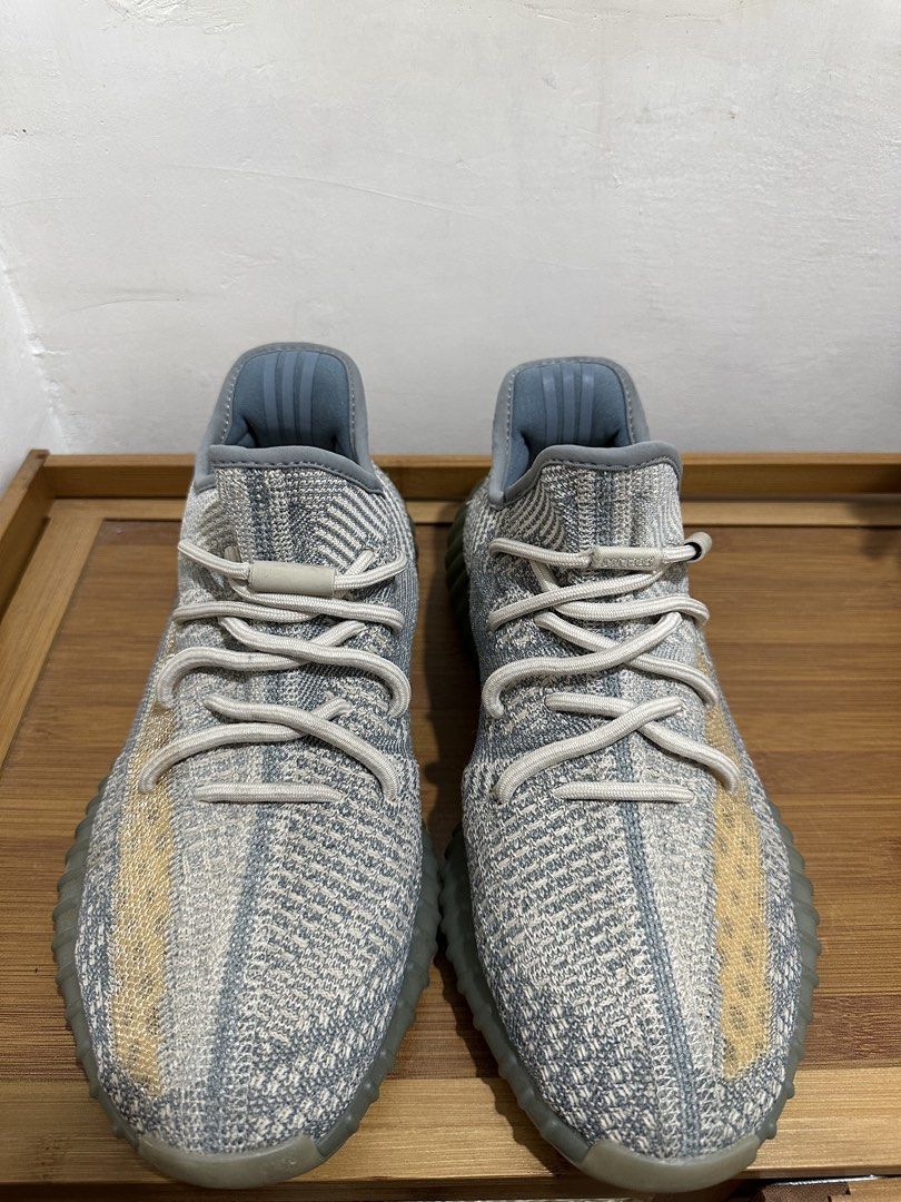 Adidas Yeezy Boost 350 V2 "Israfil" (Category: Sneakers) located in Quezon City. Submitted by andeeclutters (Listing ID 1440264454, Image 3). Description: - Adidas Yeezy Boost 350 V2 "Israfil" - Grey and yellow knit upper - Translucent sole - Lace-up closure - Comfortable and stylish for everyday wear - Perfect for sneaker collectors.