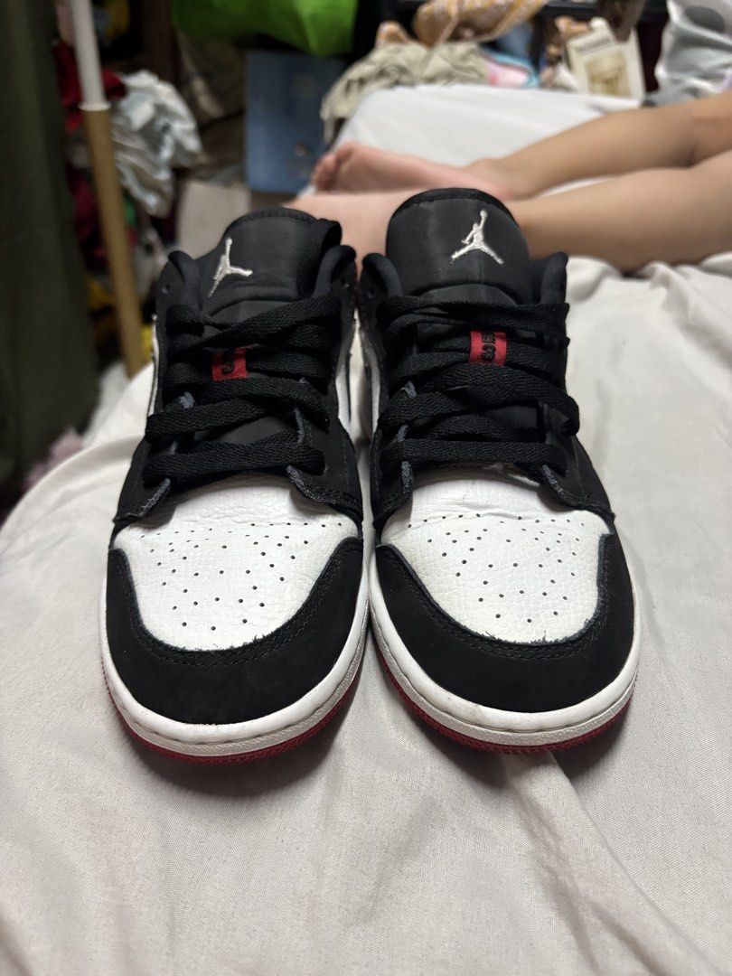 Air Jordan 1 Low Chicago Black White Red (Category: Sneakers) located in Manila. Submitted by campillane44002 (Listing ID 1440297693, Image 3). Description: - Classic Air Jordan 1 Low - Iconic Chicago colorway (black, white, red) - Perfect for everyday wear - Shows some signs of use on soles and toe box - Still has plenty of life left - Grab these must-have kicks!.