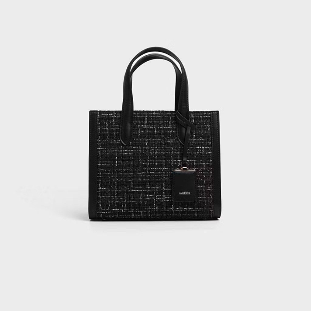 Alberto Tweed Top Handle Tote Bag Black (Category: Tote Bags) located in Quezon City. Submitted by ohcrapitsjessie (Listing ID 1440279092, Image 2). Description: Used 5x only. Good as brand new! Same as picture. With long strap.