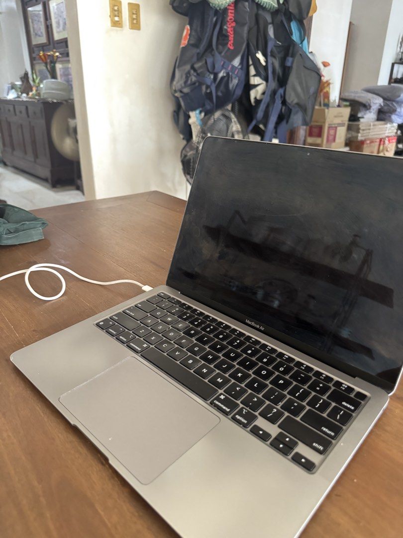 Apple MacBook Air M1 Laptop (Category: Laptops & Notebooks) located in Makati City. Submitted by cantstopshopping94 (Listing ID 1440206908, Image 3). Description: - Silver Apple MacBook Air 2020 M1 (superior chip!) - 13-inch screen - Spacious trackpad - Visible scratches on exterior - LCD needs to be replaced but no other issue. My cat scratched it :-( works perfectly fine & can still turn on!.