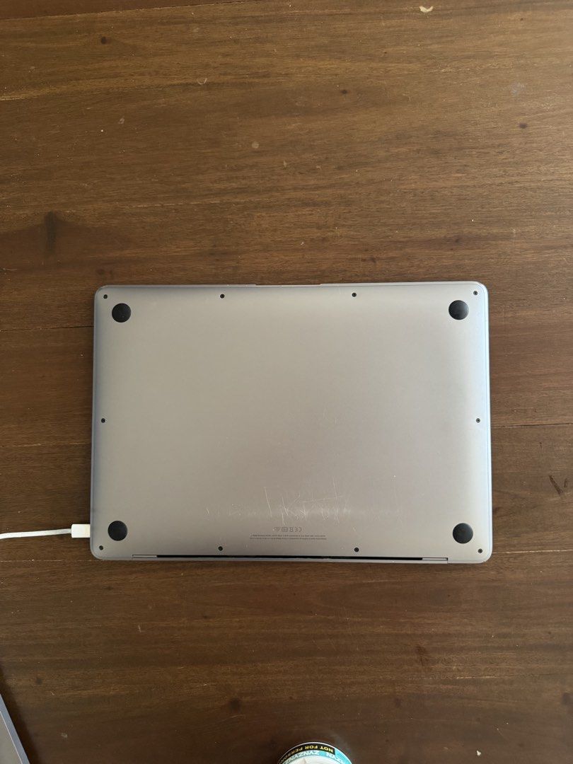 Apple MacBook Air M1 Laptop (Category: Laptops & Notebooks) located in Makati City. Submitted by cantstopshopping94 (Listing ID 1440206908, Image 2). Description: - Silver Apple MacBook Air 2020 M1 (superior chip!) - 13-inch screen - Spacious trackpad - Visible scratches on exterior - LCD needs to be replaced but no other issue. My cat scratched it :-( works perfectly fine & can still turn on!.