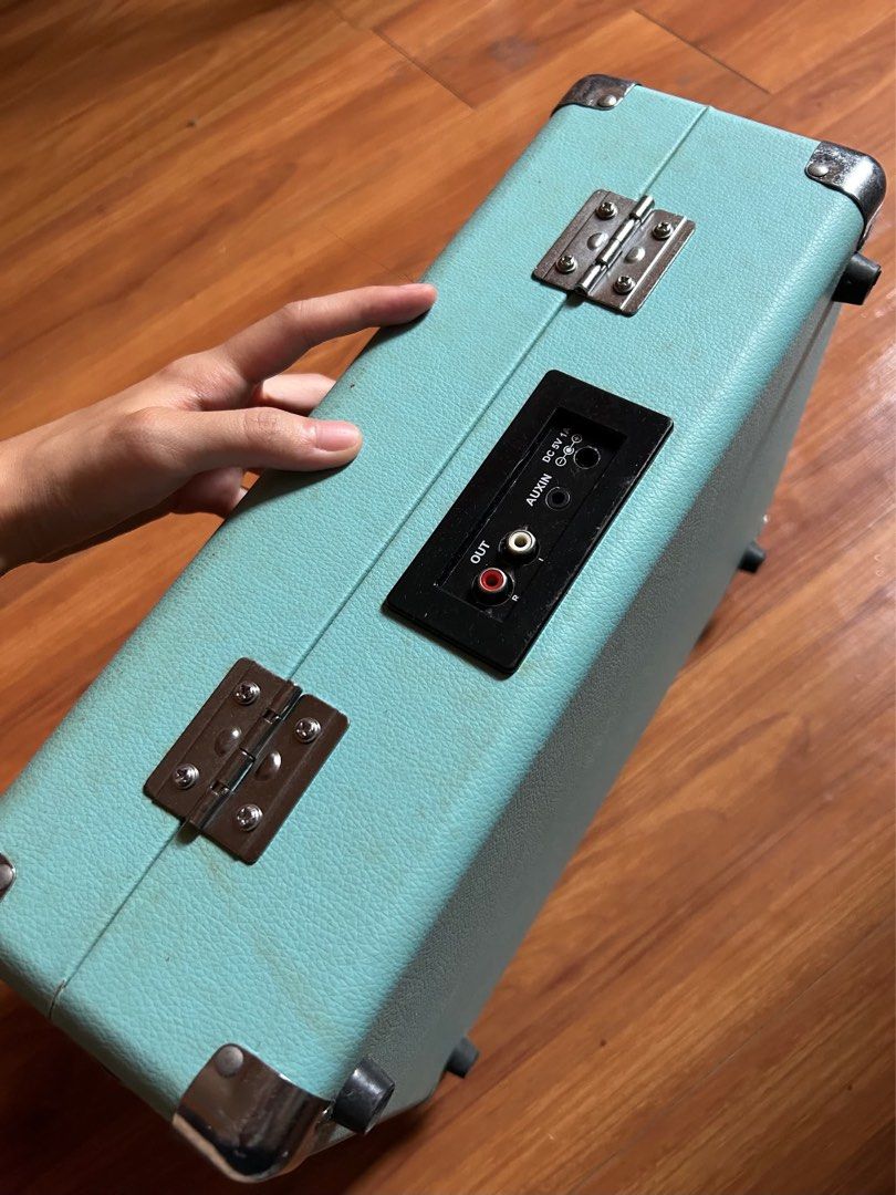 Aqua Portable Record Player with 3 Vinyl Records (Category: Portable Music Players) located in Manila. Submitted by tristancharles (Listing ID 1440287993, Image 2). Description: - Aqua blue portable record player - Cam Connect to Bluetooth - Built-in speakers for easy listening - Includes three 45 RPM vinyl records 📍Sampaloc, Manila near UST.