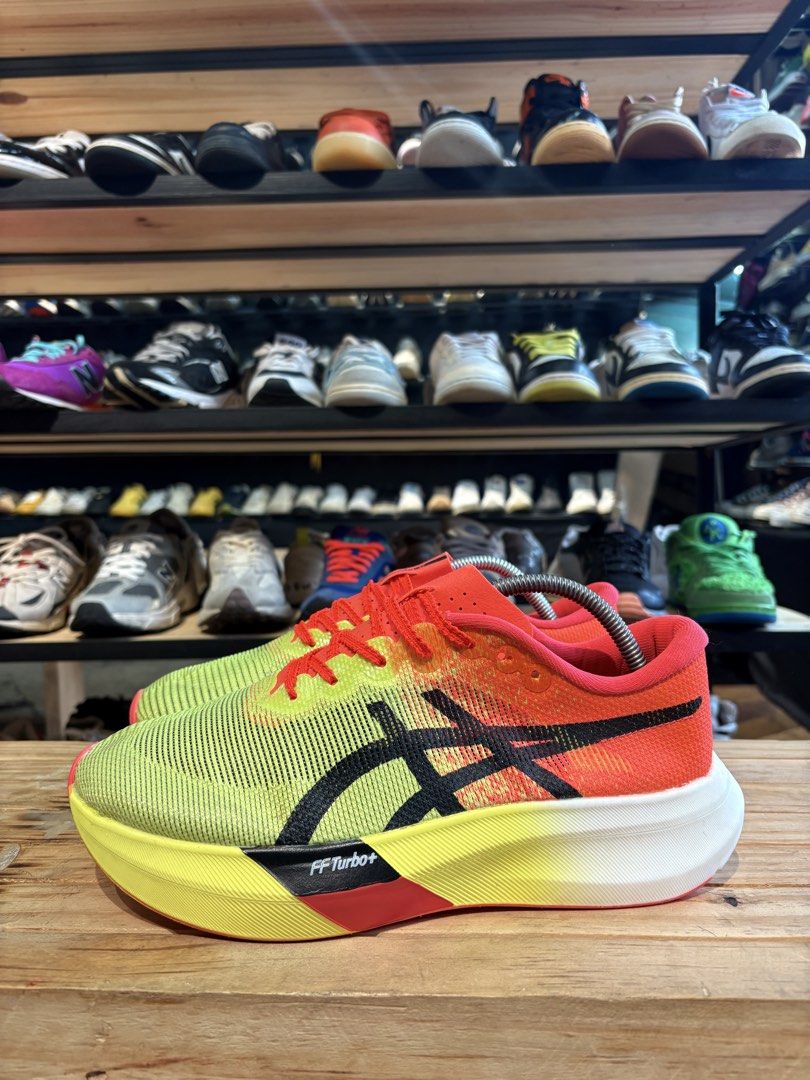 ASICS Metaspeed Sky Paris Running Shoes (Category: Sneakers) located in Baguio. Submitted by ms.j_sneakersshop (Listing ID 1440303228, Image 2). Description: - ASICS Metaspeed Sky Paris - Size: 9.5 US / 43 EUR / 27.5cm - Color: Bright yellow and orange - Type: Performance running shoes - Ideal for: Races and fast training - Features: Lightweight and responsive.
