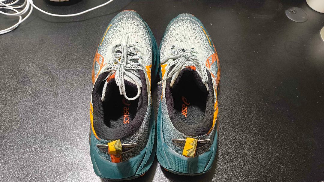ASICS Trabuco Max 4 Trail Running Shoes (Category: Sneakers) located in Quezon City. Submitted by rogurtneedsmilk (Listing ID 1440235064, Image 2). Description: AVAILABLE AS LONG AS STILL LISTED - ASICS Trabuco Max 4 trail running shoes - Striking teal, orange, and black colorway - Designed for rugged terrain - Durable outsole for excellent grip - Supportive cushioning for comfort - Breathable mesh upper - Perfect for outdoor adventures Bought th
