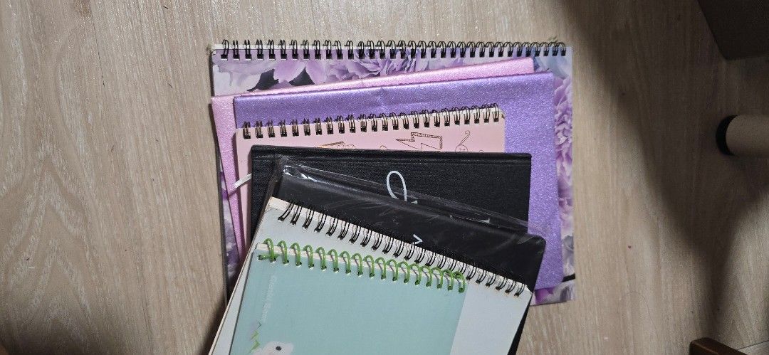 Assorted notebooks (Category: Stationery & School Supplies) located in Singapore. Submitted by riuslei (Listing ID 1440342137, Image 1). Description: total 7 notebooks im decluttering my room and found alot of notebooks that were empty take a few or take all, its up to you.