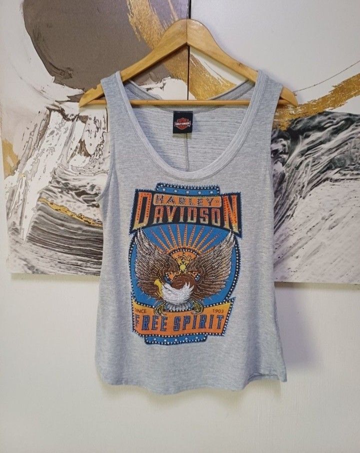 AUTHENTC HARLEY DAVIDSON RINESTONE EAGLE (Category: Shirts) located in Manila. Submitted by tokyo.americana (Listing ID 1440235510, Image 2). Description: Actual size using inches Armpit to Armpit/17 Lenght/27 fittings is Medium Excellent Condition, Issue:0 Message if you have any other question about sizing. We do shipping nation wide I'm also open for video call so that you can see the item you 're interested to buy. Courier, DHL,JNT,LBC Mode o