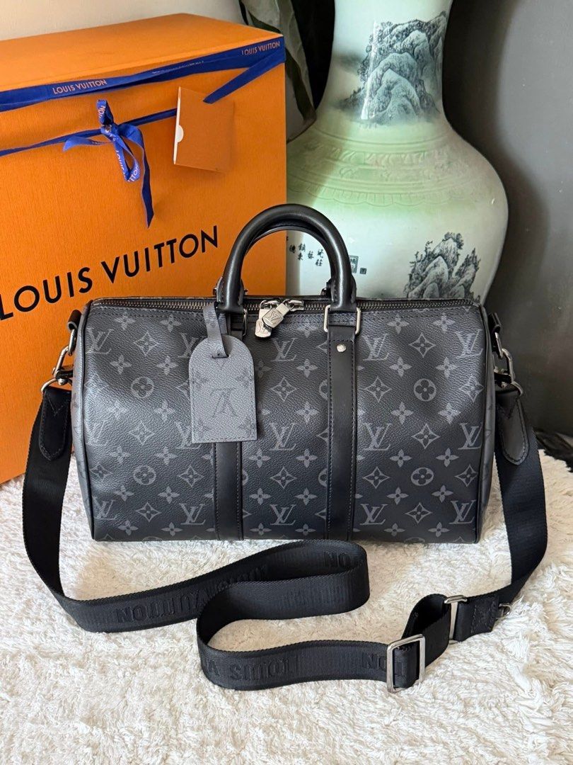 Authentic Louis Vuitton Keepall 35 Eclipse Microchip (Category: Luxury Bags & Wallets) located in Quezon City. Submitted by jhaediah (Listing ID 1438346453, Image 2). Description: Keepall 35 Eclipse Microchip 2025 Purchased Comes with Box,Dust bag,Cards and Receipt‼️ .