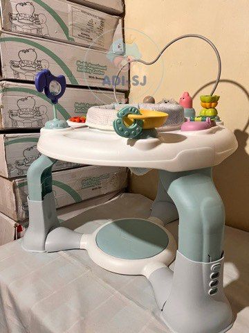 Baby Company Multi-Functional Activity Center with Bouncer (Category: Infant Playtime) located in Manila. Submitted by airacruz0048042 (Listing ID 1440355587, Image 2). Description: - Baby Company Multi-functional Activity Center - Includes a bouncer seat - Features numerous interactive toys and activities - Sturdy legs ensure stability - Promotes playtime and baby's development - Simple and easy assembly.