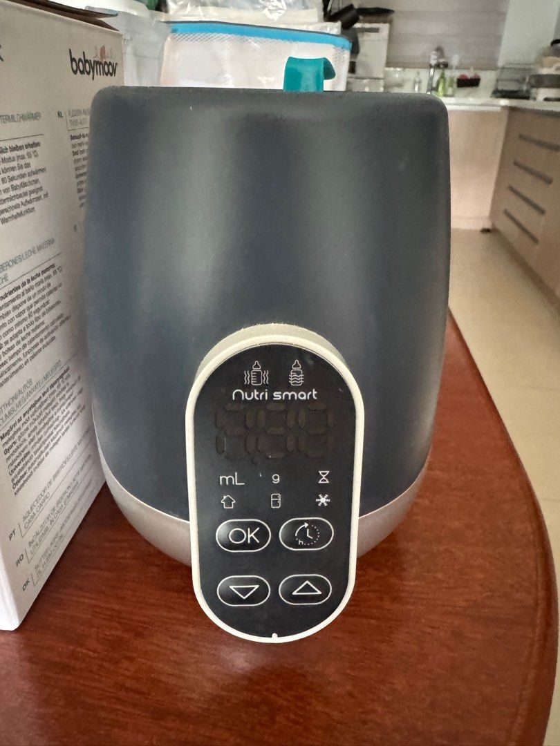 Babymoov Nutrismart Bottle Warmer (Category: Breastfeeding & Bottle Feeding) located in Manila. Submitted by bunanni (Listing ID 1440200056, Image 2). Description: You can set depending on the volume of the milk your warming. It adjusts the minutes and is able to keep it warm for long. We use this to thaw frozen breastmilk. But you can use this also to warm baby food It has a car adaptor too! Original price 4500.