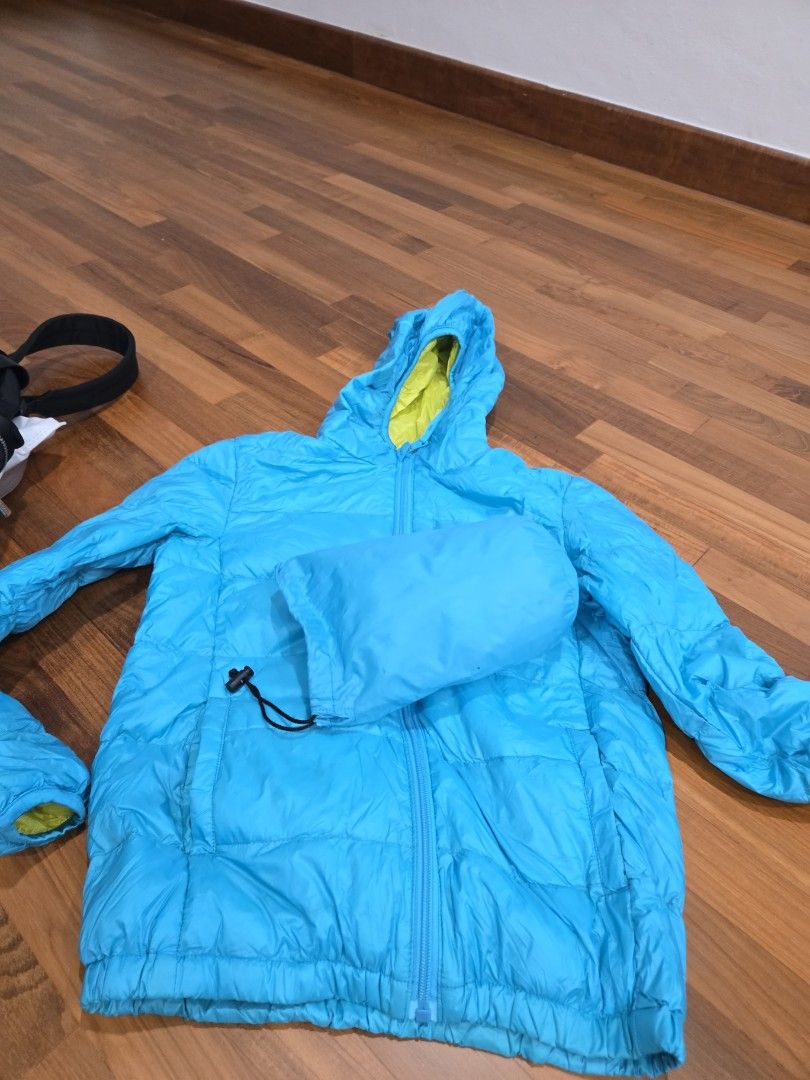 Blue Hooded Down Jacket (Category: Babies & Kids Fashion) located in Singapore. Submitted by starpocket (Listing ID 1440240708, Image 2). Description: - Lightweight blue hooded jacket - Bright yellow lining - Warm and perfect for cooler weather - Great for layering or wearing alone - Easy to pack and carry.