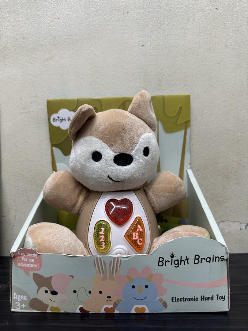 Bright Brains Electronic Hard Toy Plush Animals (Category: Plushies & Soft Toys) located in Manila. Submitted by airacruz0048042 (Listing ID 1440354723, Image 2). Description: - Cute electronic plush toys from Bright Brains - Interactive buttons light up and make sounds - Helps kids learn numbers and letters - Suitable for ages 3 and up - Available in elephant, fox, dinosaur, and kangaroo designs - Perfect for early learning.