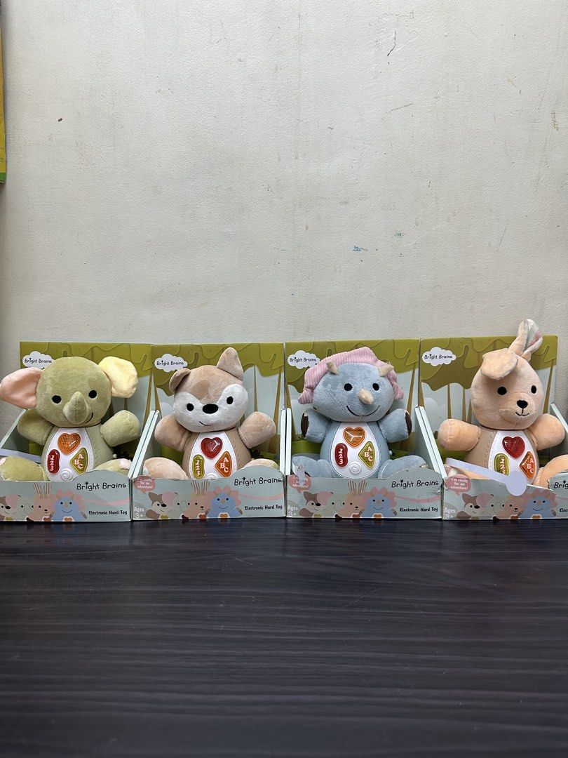 Bright Brains Electronic Hard Toy Plush Animals (Category: Plushies & Soft Toys) located in Manila. Submitted by airacruz0048042 (Listing ID 1440354723, Image 1). Description: - Cute electronic plush toys from Bright Brains - Interactive buttons light up and make sounds - Helps kids learn numbers and letters - Suitable for ages 3 and up - Available in elephant, fox, dinosaur, and kangaroo designs - Perfect for early learning.