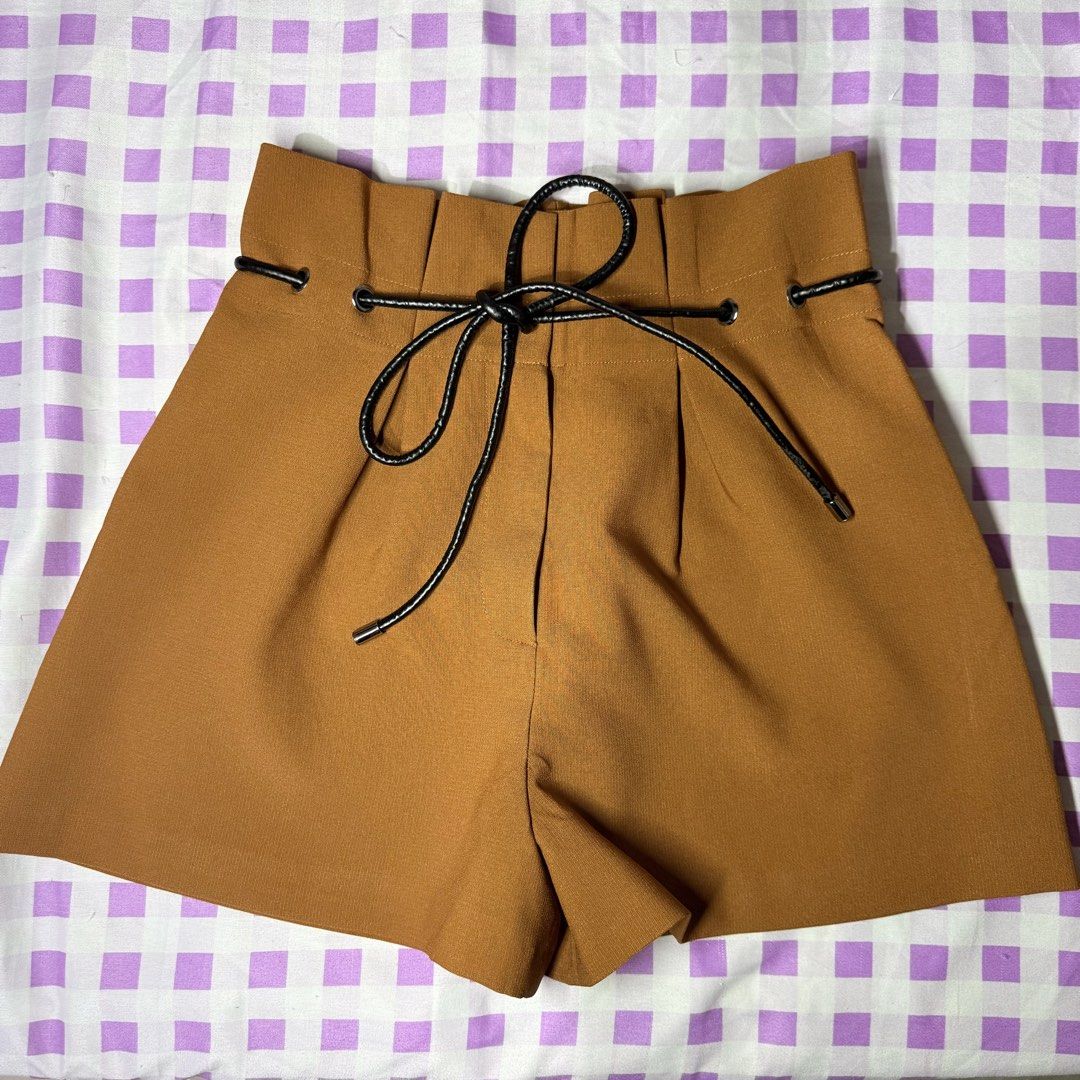 Brown Orange Paperbag Shorts with Black Drawstring (Category: Shorts) located in Tarlac. Submitted by milkshakeee_ (Listing ID 1440356166, Image 1). Description: Size: 28-32 | Length: 16 | Hips: 40 Washed & Ready to wear 🌸 NO WHEN WORN! Location: Tarlac City MOP: Gcash Ship thru J&T.