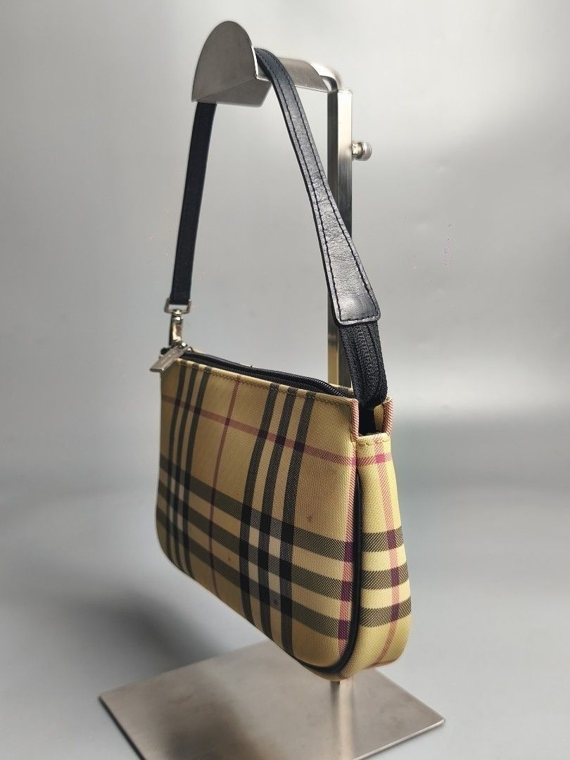 Burberry Nova Check Pochette (Category: Luxury Bags & Wallets) located in Bulacan. Submitted by 4kcollection.ph (Listing ID 1440210261, Image 3). Description: Burberry Nova Check Pochette Pre-loved from Japan 🇯🇵. Very Good Condition Size: Small Need Clean Body No major issue Dm for sure buyer 📩 MOP: Gcash / Maya / BPI Courier: J&t / Lbc / Lalamove Location: SJDM Bulacan.