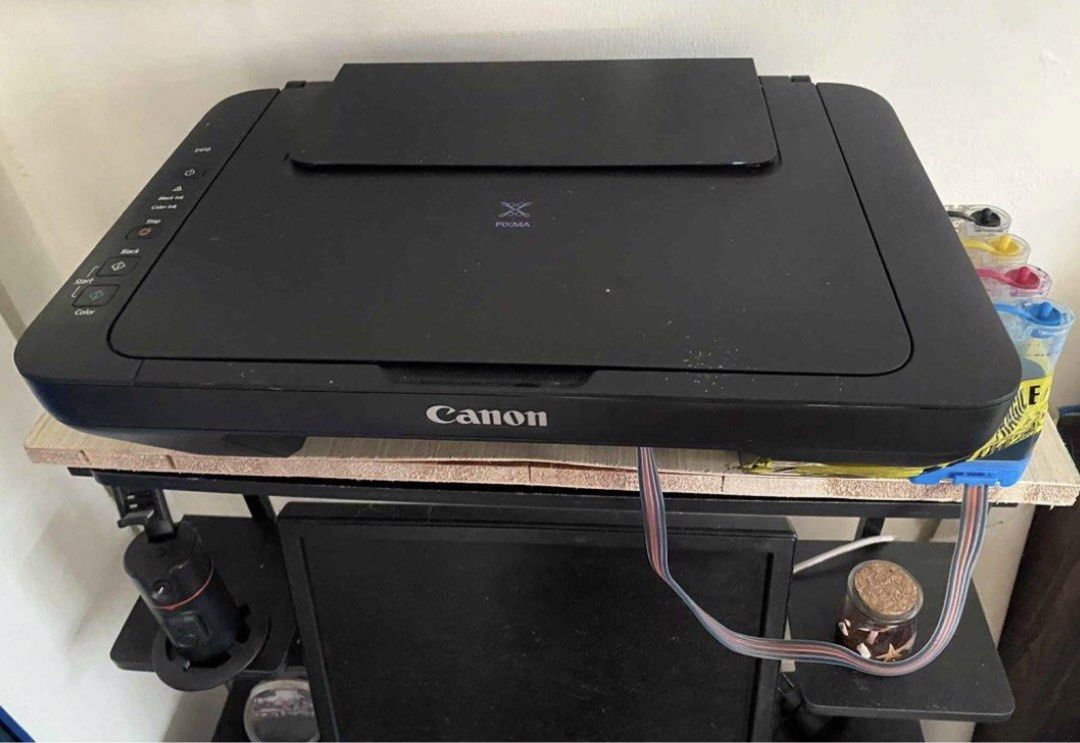 Canon Printers (MG3670 and E410) (Category: Printers, Scanners & Copiers) located in Trece Martires City. Submitted by rownin (Listing ID 1440214628, Image 3). Description: - Canon PIXMA MG3670 All-in-One Printer - Functions: Print, Scan, Copy - Color: Stylish Red - Connectivity: Wireless - Ideal for: Home or Small Office Use Honest issue- no issue, for cartridge replacement Take also - Canon E410 - continuous ink Honest issue - converted to CIS 